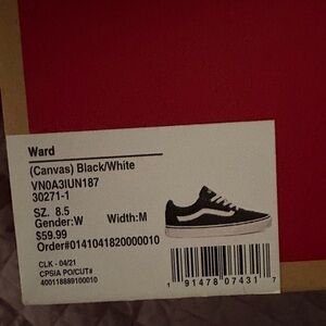 Vans Black and White Canvas Sneakers